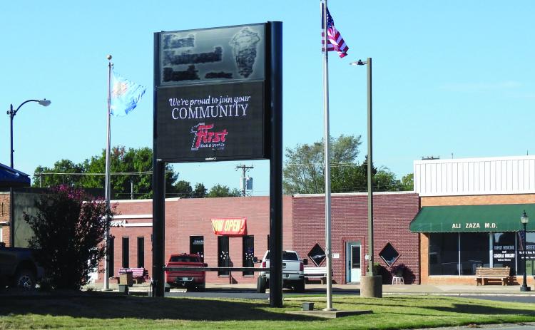 New signs were in place Monday as the failed First National Bank of Lindsay reopened as a branch of the Duncan-based First Bank &amp; Trust Co. Federal regulators closed the bank Oct. 18, after identifying false and deceptive bank records and other information suggesting fraud and depletion of the bank’s capital.
