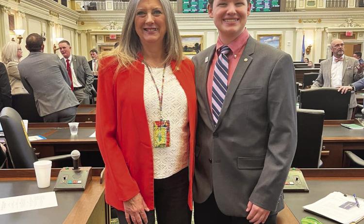 Eli Conner (right), a senior homeschool student from Lindsay, had the opportunity to serve as a page for Rep. Cindy Roe (left) at the State Capitol this week.