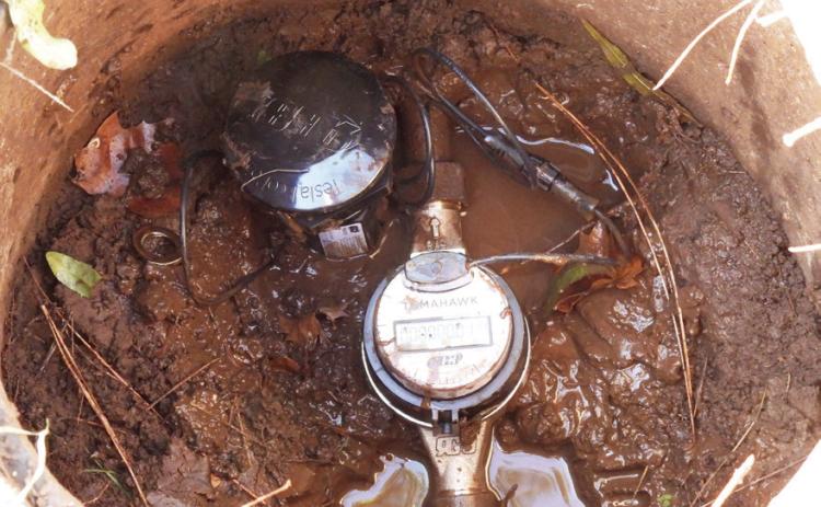 Crews have begun installing new water meters on the northeast side of Pauls Valley. The new meters, which will eventually be installed citywide, are more accurate and can be read remotely from the street. News Star photos by Chris Mackey