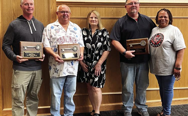 Pauls Valley educators Mark Green, Kirk Moore and Chad Chronister were presented with ceremonial Keys to the City of Pauls Valley Friday in recognition of their actions to protect students and staff at Pauls Valley High School from an armed intruder who entered the school and fired shots on April 7. Pictured left to right, Mark Green, Kirk Moore, PV Vice Mayor Bonnie Meisel, Chad Chronister and PV Mayor Jocelyn Rushing. News Star photo by Suzanne Mackey