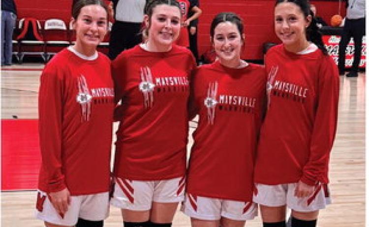 Maysville seniors, from left, Allison Sanders, Jolie Summers, Jaci McGowen and Avery Riley pose after a game. Courtesy photo 