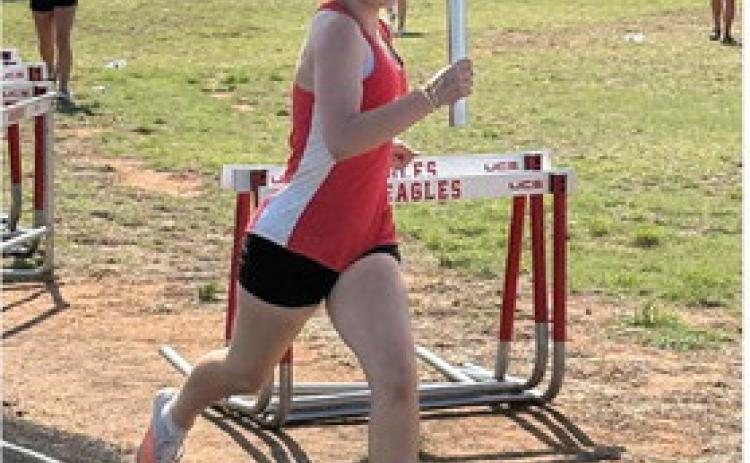 Maysville junior high runner MaKynna Kesler runs a relay at Waurika. Courtesy photo