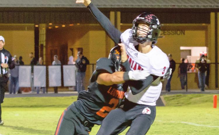 Lindsay’s Ty Ferguson tackles the Tishomingo quarterback. Photo by Kristy Schrader