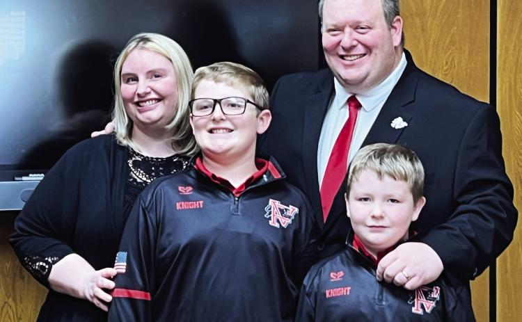 Brett Knight with his wife, Lucy, and their two sons at a special meeting of the Pauls Valley Board of Education April 11. During the meeting, board members voted to hire Knight as superintendent of Pauls Valley Schools beginning July 1. News Star photo by Suzanne Mackey