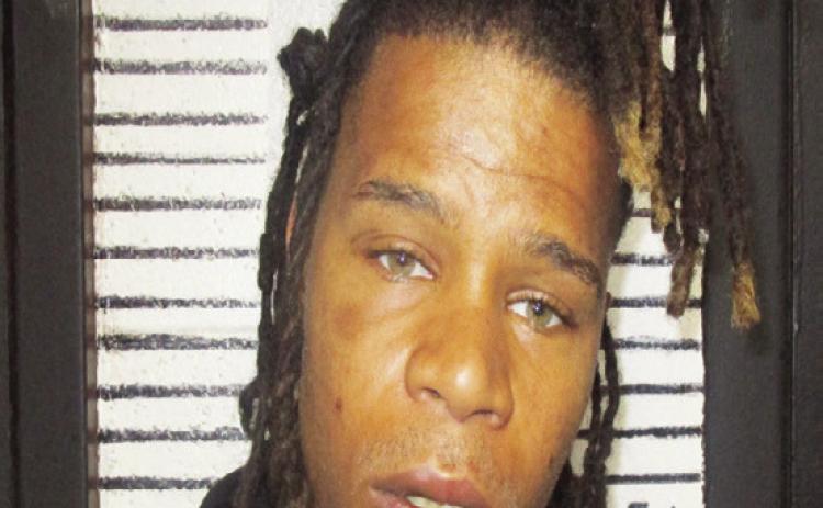 One in custody after shooting at local convenience store