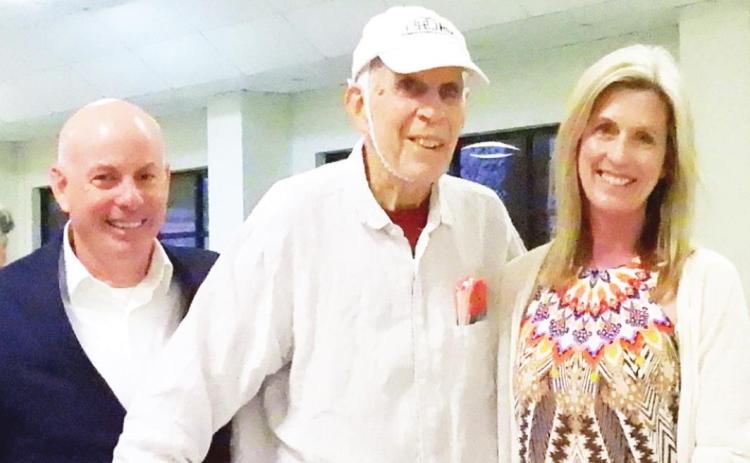 The Vault Art Space and Gathering Place was named Corporate Citizen of the Year at the Pauls Valley Chamber of Commerce Celebration Tuesday night. Susie Agee (right), owner of The Vault, with her father, Phil Marsh (middle), and husband, Jasen Agee (left).
