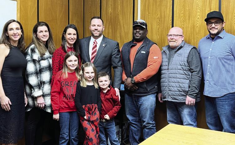 Pauls Valley School Board members hired Adam McPhail as the district’s superintendent Monday. McPhail is pictured center with his wife, Ashley, and their children Adalynn, Addyson and Anderson.