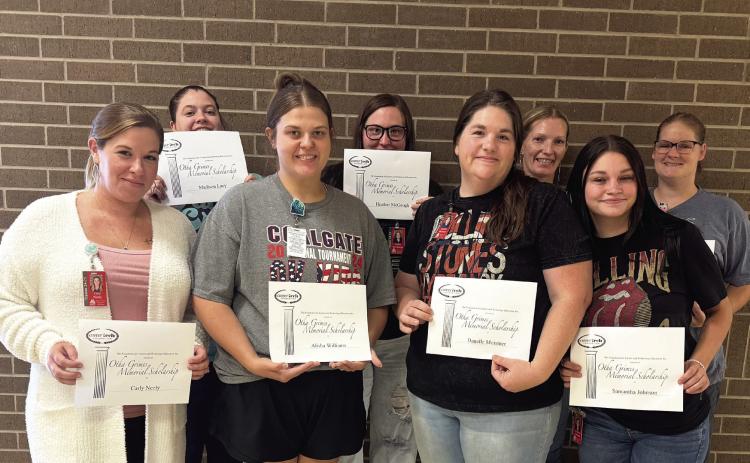 Students who recently received the Fall 2024 Otha Grimes Memorial Scholarship are (back row, l-r) Madison Lacy, Heather McGough, Skyla Delahoussaye, and Shaylah Nirk, (front row, l-r) Carly Neely, Alisha Williams, Danelle Moistner, and Samantha Johnson.