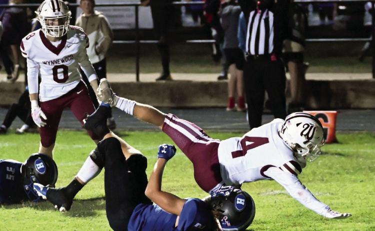 Wynnewood’s Deagan Dixon stretches across the goal line for a touchdown in last week’s 16-7 win over Healdton. News Star photo by Don Coffey