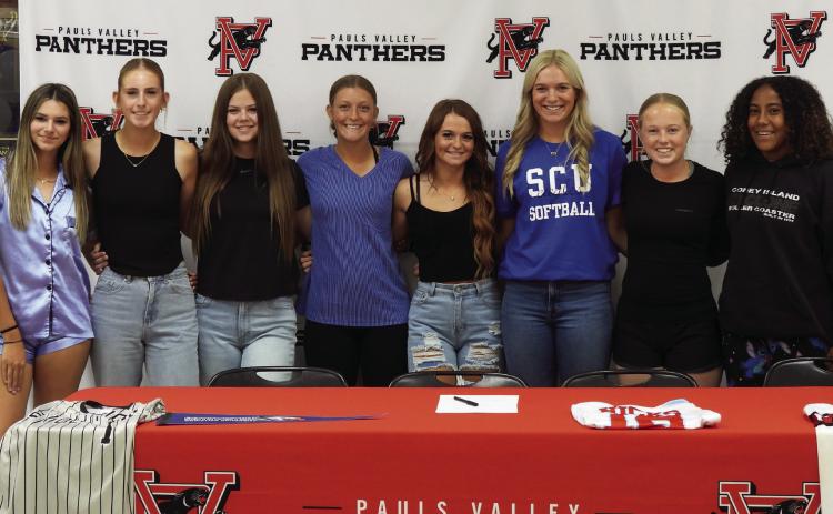 Pauls Valley senior Isabelle Hicks poses with her Lady Panther teammates Sept. 18 after signing a letter of intent to play collegiate softball for the Southwestern Christian University Eagles in Bethany next year. News Star photo by Chris Mackey