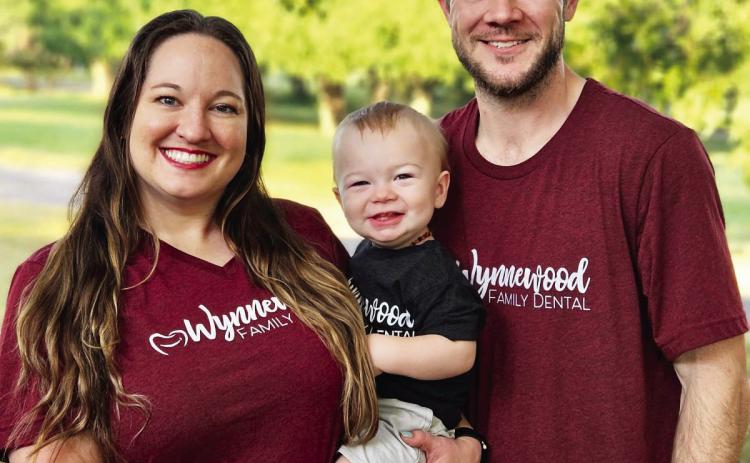 Mary Temple-Goins with her husband, Michael, and their son. Courtesy photo