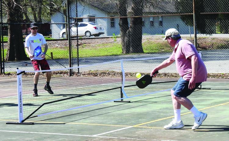 Pickleball competitors enjoy a doubles match during the first-ever Pickle in the Park tournament at Wacker Park April 12. News Star photo by Chris Mackey