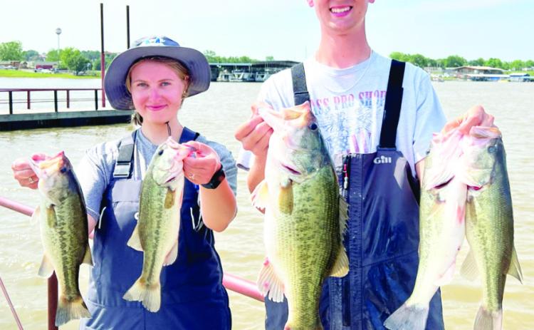 Murray State College Bass Fishing Team Duo, Paris McCullers and Fisher Hill, show off their winning catches of the tournament. Courtesy Photo