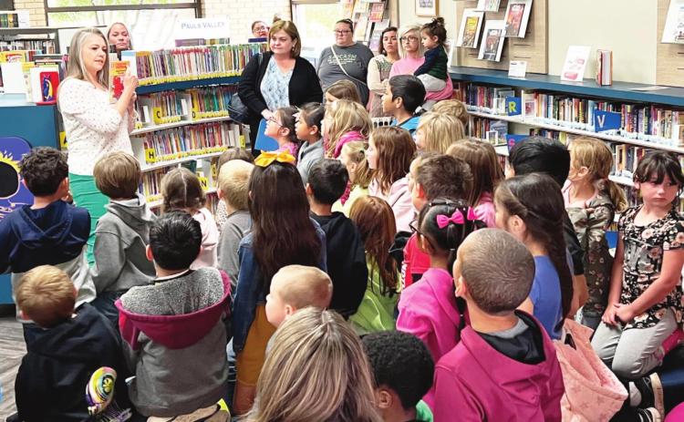 First-graders from Whitebead Schools took a field trip to the Nora Sparks Warren Library in Pauls Valley on Tuesday. They learned how to navigate the library, check out a book, and got a preview of the upcoming Summer Reading Program.