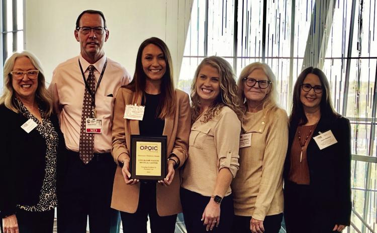 From left to right: Barbara O’Brien, President of OPQIC; Dr. Richard McClain, Chief of Obstetrics CNMC; Ashley Kreis, OB Manager CNMC; Mallory Henderson, OB Assistant Manager CNMC; Kathy Gilchrist, Quality RN CNMC; Joyce Marshall, Oklahoma State Department of Health