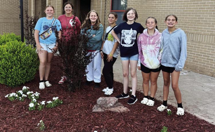 The sixth grade horticulture class at Maysville Elementary school recently cleaned up and planted new flowers in the flower bed in front of the elementary school. Courtesy photo