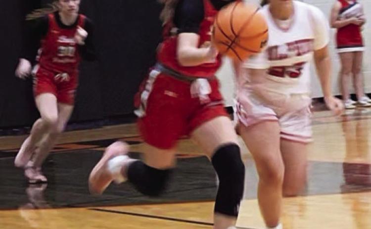 Pauls Valley’s Kate Taylor dribbles down court on a fastbreak against Sulphur. The junior reached 1,000 career points during the game. News Star photo by Jennifer Lindsey