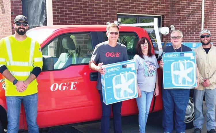 (Left to Right) OG&amp;E Lineman Kael Guthrie, OG&amp;E Community Affairs Manager Richard Delano, Pauls Valley Senior Center Director Sherri Thomas, OG&amp;E Community Outreach Coordinator John Koons and OG&amp;E Lineman Clint Hawkins pose outside of the Pauls Valley Senior Center before distributing electric fans to local seniors to help them battle the summer heat. Photo courtesy of OG&amp;E