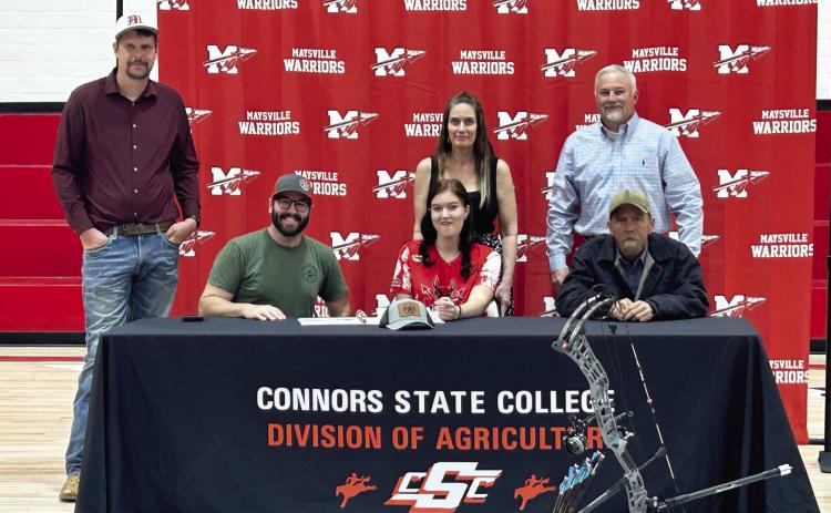Maysville senior Madison Hunter signed her letter of intention to Conners State College for archery Feb. 28. Pictured from left are Maysville Archery Coach Brad Uhles; Connors State Archery Coach Jonny King; Madison Hunter (seated); her mother, Rebecca Hunter; her father, Paul Hunter (seated); and Maysville Archery Coach and Principal John Edwards. Courtesy photo