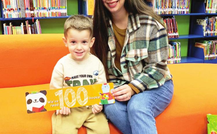Cord Lofton and his mother Chalie are recognized as Chandler-Watts Memorial Library’s first 100 Book Club members since beginning the 1,000 Books Before Kindergarten program. Cord is 4 years old and has been visiting the library and participating in StoryTime since he was a year old. Currently his favorite book is “Jack and the Beanstalk,” and he is an avid fan of dinosaurs, big and small. Photo courtesy of Teresia Jors
