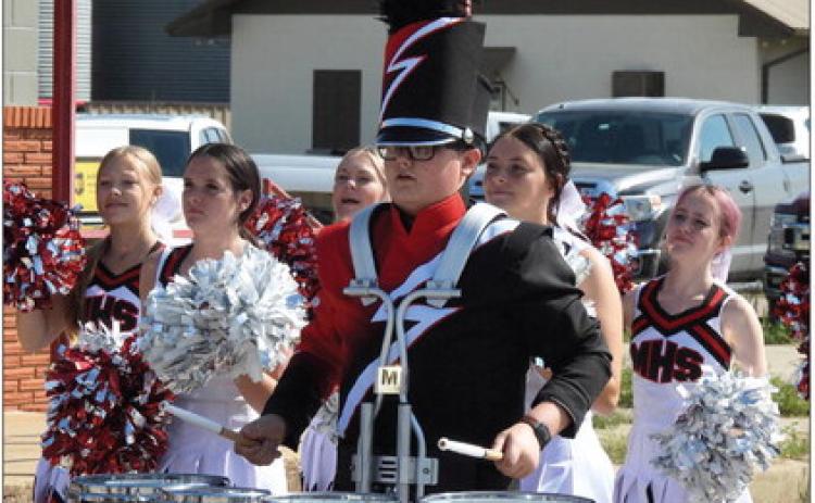 The Maysville High School marching band and cheer team led a short parade down Main Street during Saturday’s Wiley Post Festival in Maysville. After the parade the band assembled at the intersection of Main Street and Williams Street to play for the crowd gathered there. News Star photo by Chris Mackey