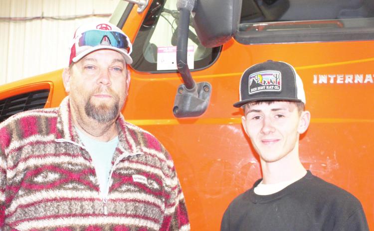MATC Lineworker Technology teacher Bruce Beam and Dylan Moore on Moore’s last day of class. Courtesy Photo