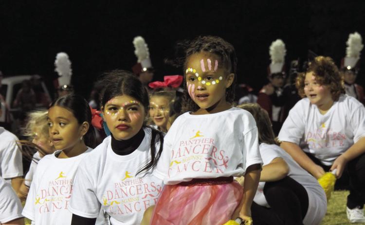 Pom camp participants dazzle halftime crowd