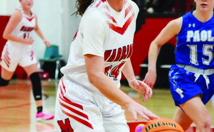 Maysville’s Allison Sanders brings the ball down court during Tuesday’s homecoming game against Paoli. The Lady Warriors beat Paoli, 36-22, to bring their season record to 10-2. News Star photo by Denny Park